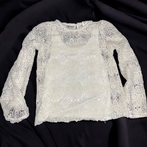 Girl’s long sleeve lace top with a built in Cami. The top is from Art Class.